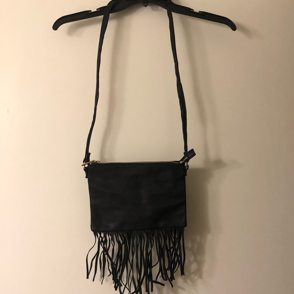 H&M small black purse. Fringe on bottom. Only used once!